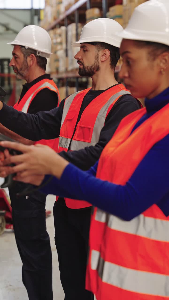 Warehouse workers scanning inventory
