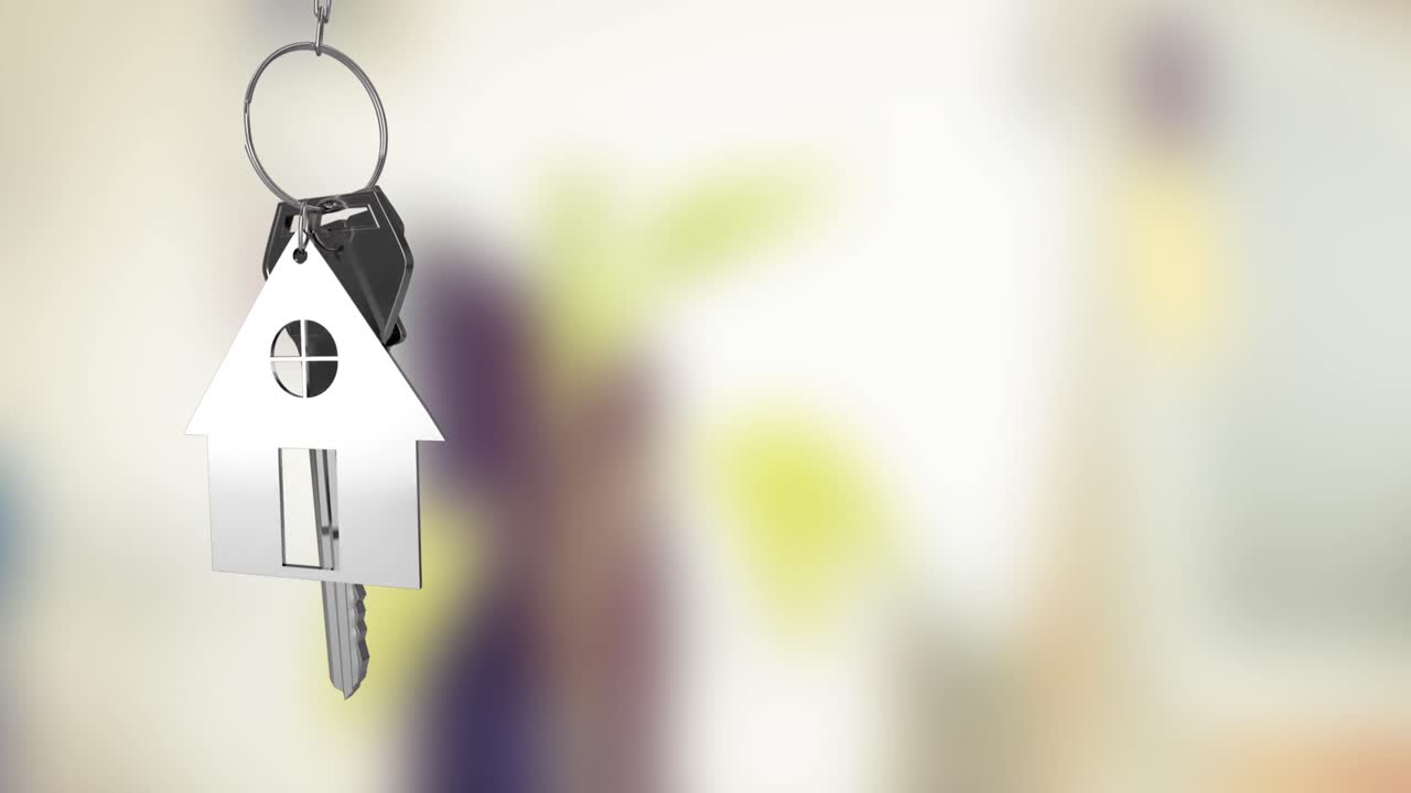 animación de la llave con el llavero de la casa sobre un fondo borroso
