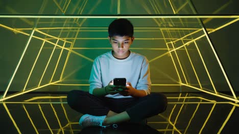 young person using smartphone in futuristic neon light setting