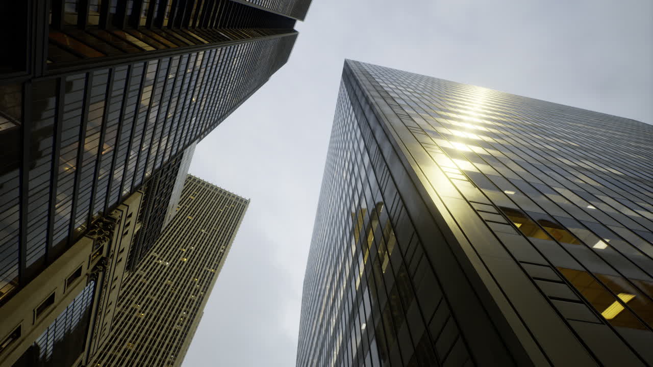 Skyscrapers reach for the sky in a bustling urban setting during cloudy day