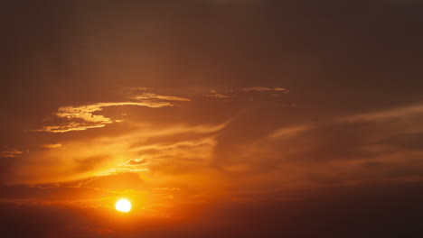 timelapse of sunset in cloudy sky