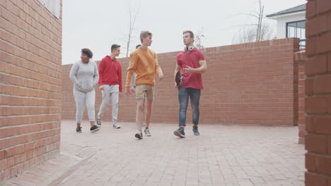 students walking in their high school grounds