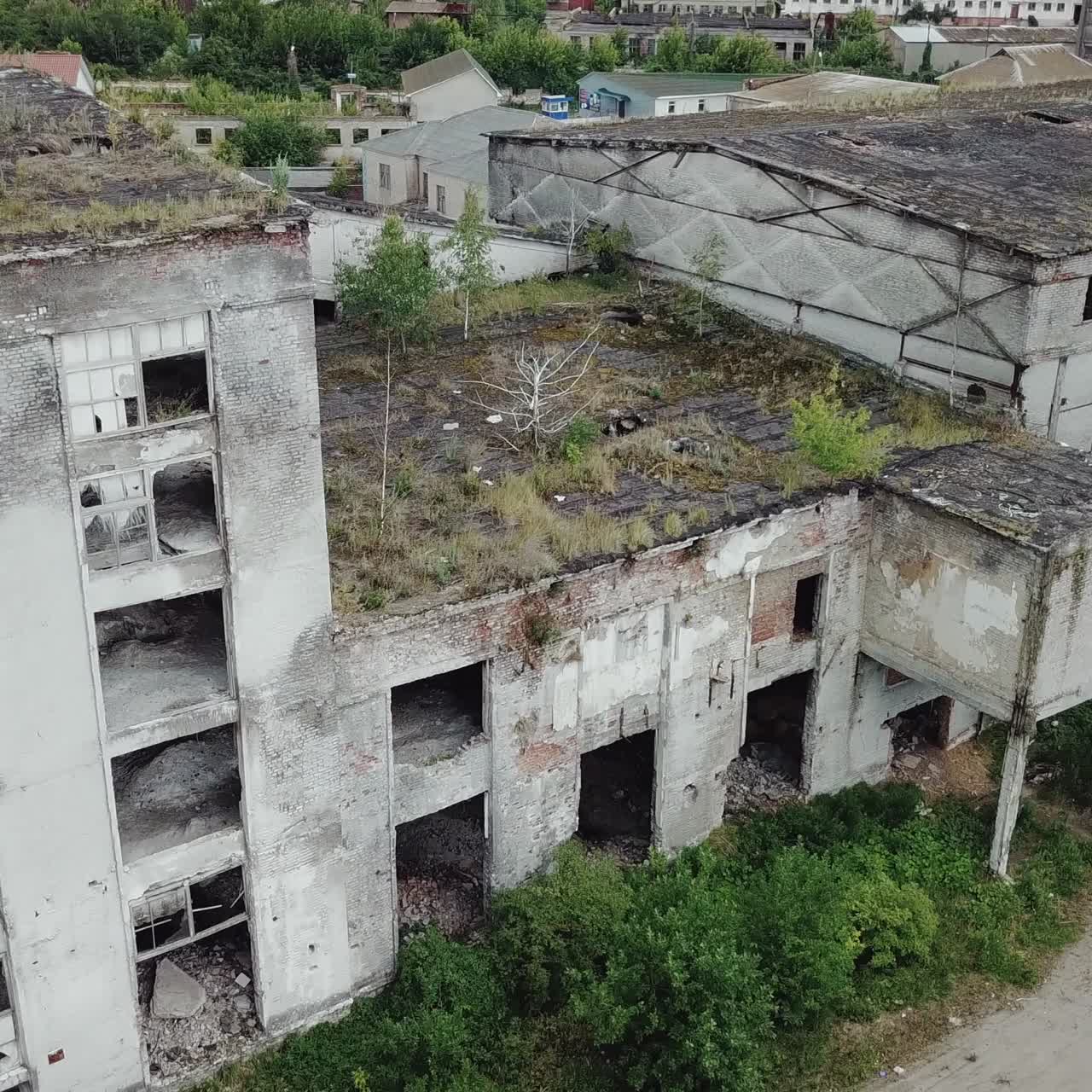 Ruins of a very heavily polluted industrial factory. Old industrial building for demolition. Aerial view