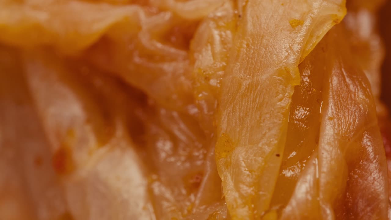 Close-up of texture fermented spicy cabbage kimchi with in can. Preservation of vegetables in glass jars. Fermentation preserved kimchi cabbage with spices macro. Asian cuisine.