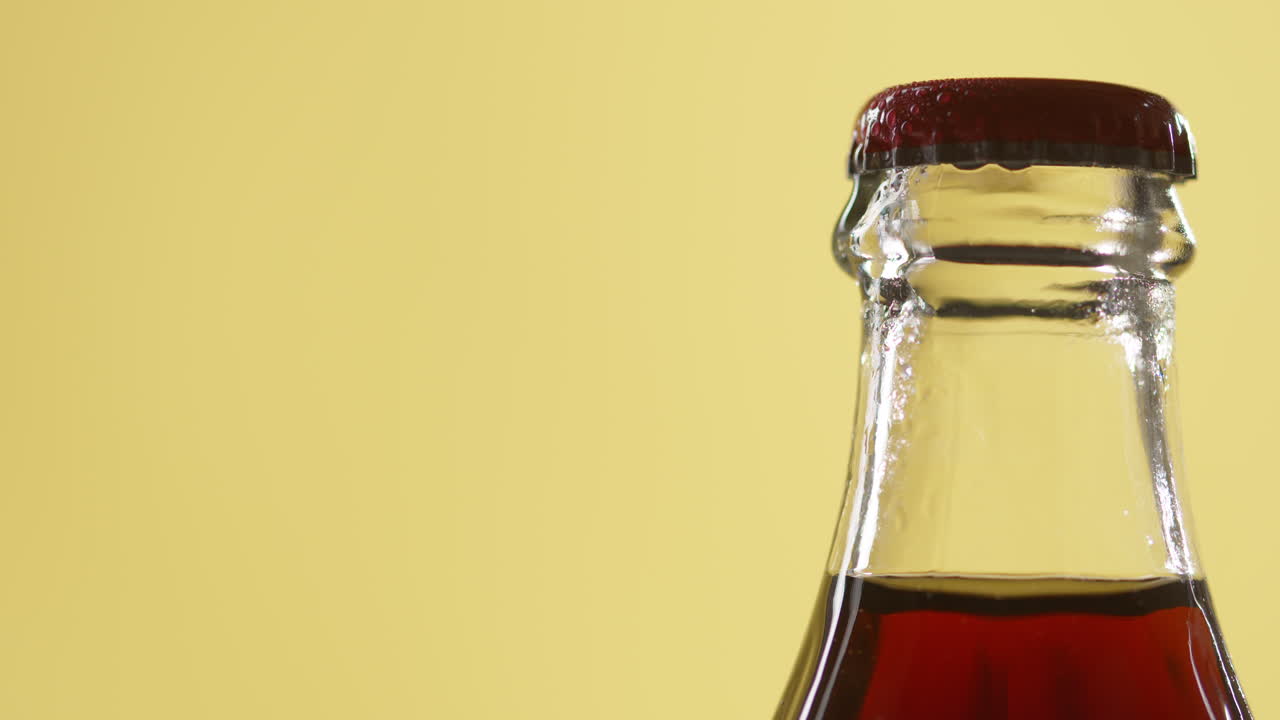 Close Up Of Condensation Droplets On Neck Of Bottle Of Cold Beer Or Soft Drink With Metal Cap