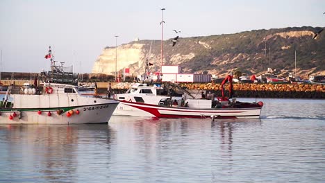 Two-ships-passing-each-other-in-a-seaport-area