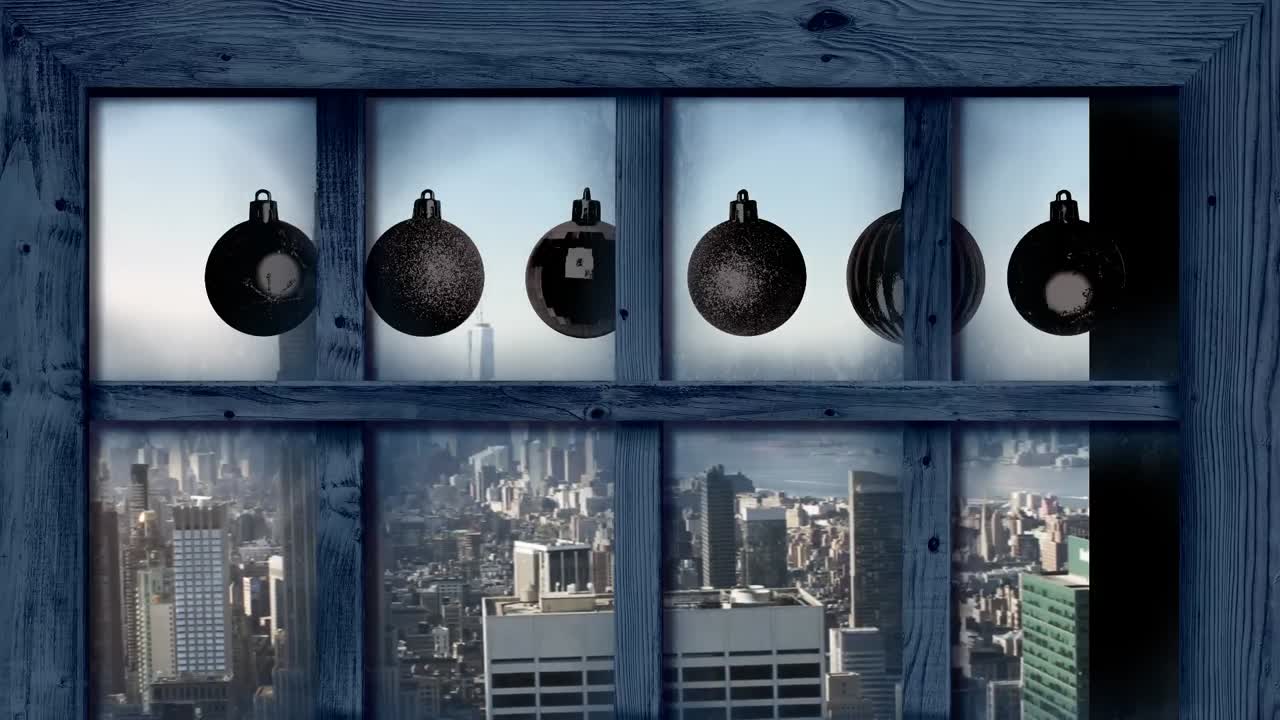 크리스마스 보블과 도시 풍경의 공중 전망 위에 나무 창문 프레임