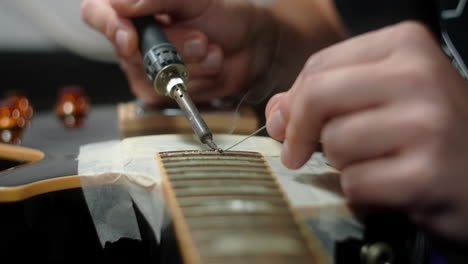 guitar repair with soldering iron