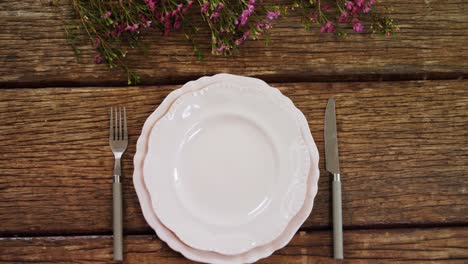 various cutlery on wooden table 4k