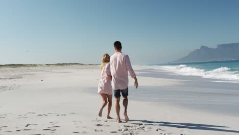 couple in love enjoying free time on the beach together