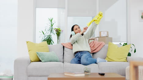 music, headphones and woman on sofa after cleaning