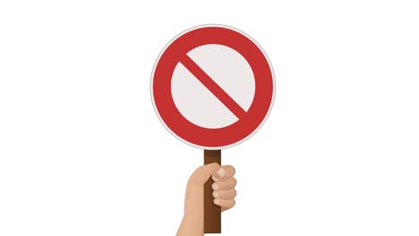 a hand holds up a prohibition sign on white background