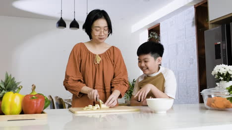 woman cutting bananas.