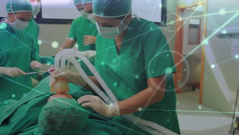 red de conexiones contra un grupo de cirujanos que realizan una operación en la sala de operaciones