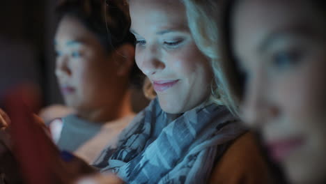 friends using technology at home at night hanging out shopping online