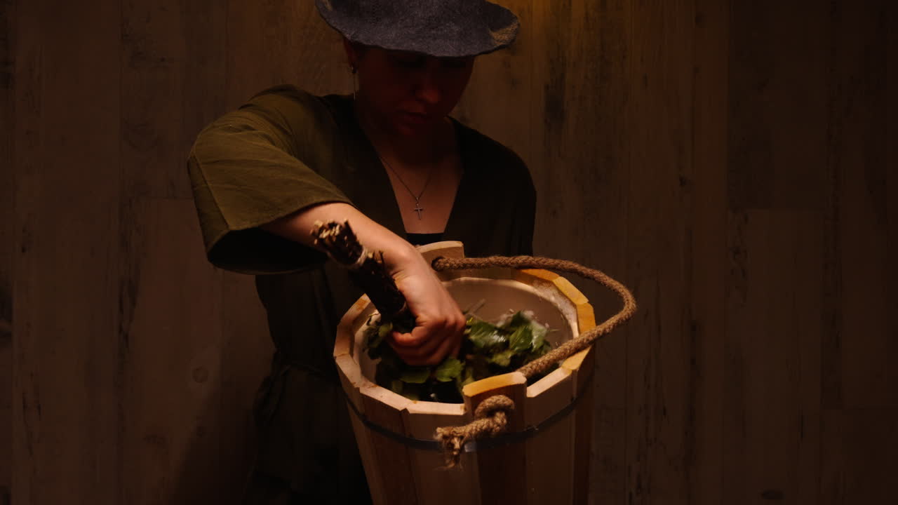 Woman preparing for a sauna session