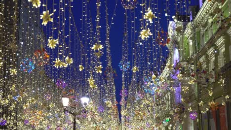 nikolskaya street, moscow, russia. night walk on the illuminated street