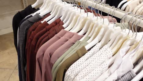 a rack of clothing in a store