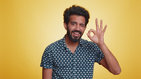 man looking approvingly showing ok approve feedback gesture like sign positive something good