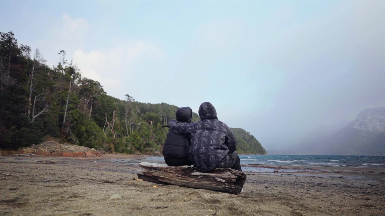 Couple Embracing on Lakeshore in Bariloche Patagonia Argentina travel Landscape