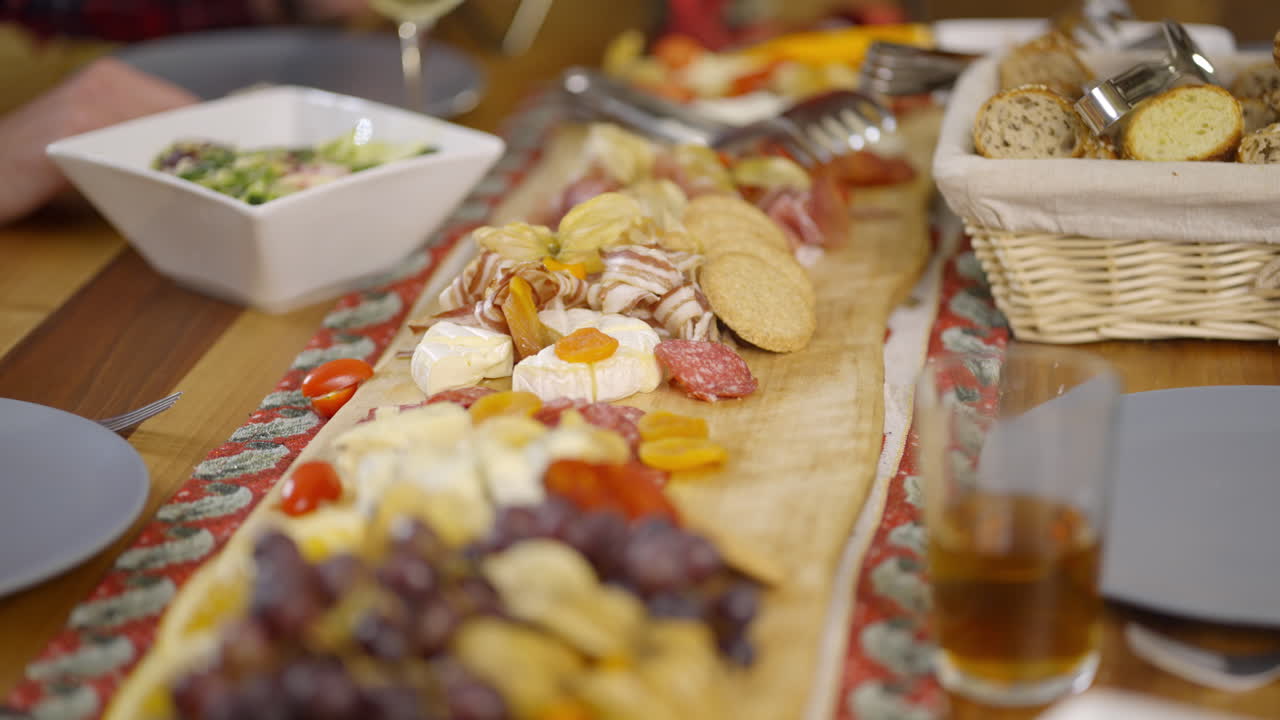 A charcuterie board with various foods