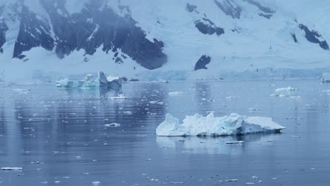 Antarctica-Iceberg-Mountains-and-Ocean,-Beautiful-Dramatic-Blue-Coastal-Landscape-and-Seascape-on-Antarctic-Peninsula-Coast,-Icy-Winter-Sea-Scene-with-Ice