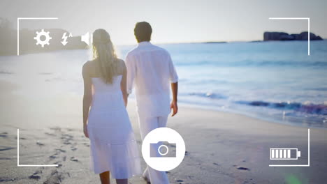 tomando fotos de una pareja con una cámara digital