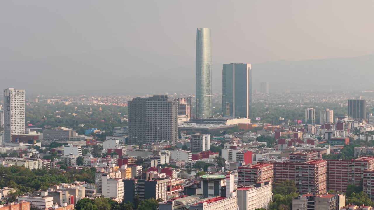 Drone shot of polluted Mexico City skyline