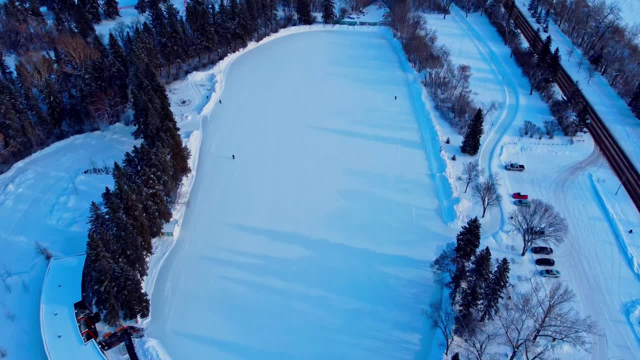 Aerial panout dolly roll down to birds eye view over Canada's Largest ...