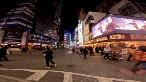 pedestrians crossing at vibrant city intersection