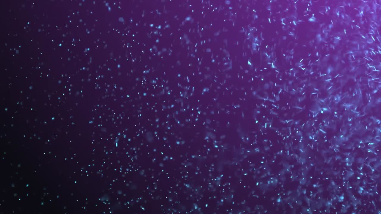 Animación de múltiples partículas brillantes azules y moradas moviéndose y retorciéndose en un bucle continuo sobre fondo púrpura.