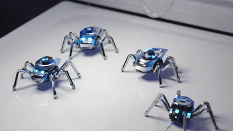 robotic spiders with glowing blue lights