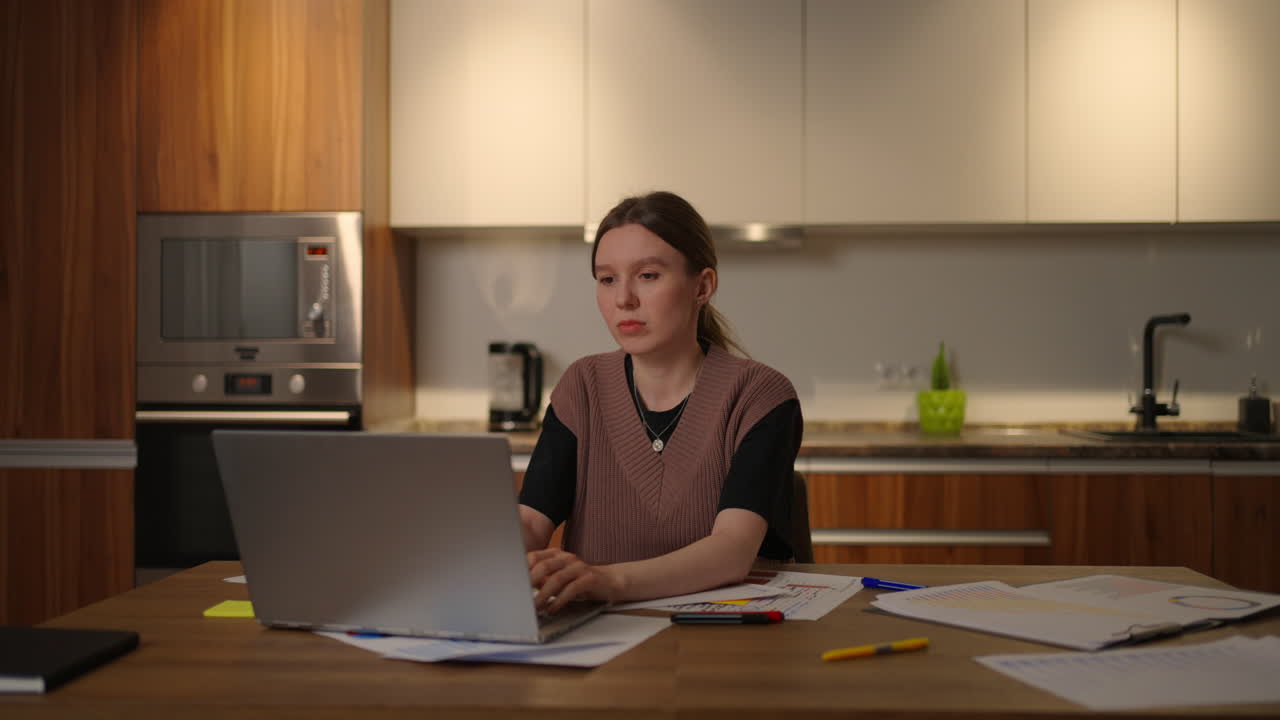 Exhausted young businesswoman or student finished computer work stretching relaxing seated at workplace feeling stress relief satisfied project accomplishment task done in time. severe pain in neck