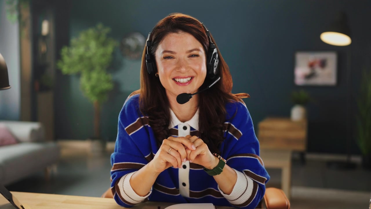 Friendly Woman Wearing Headset Talking During Video Call