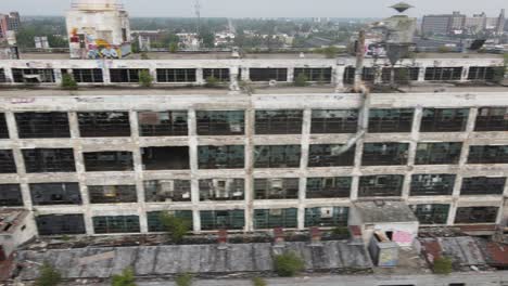 abandoned fisher body automotive plant 21 in detroit, michigan drone shot.