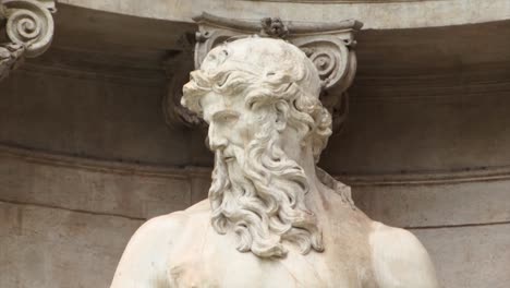 Close-up-image-of-the-statue-of-the-god-Neptune-in-the-Trevi-Fountain,-Rome,-Italy