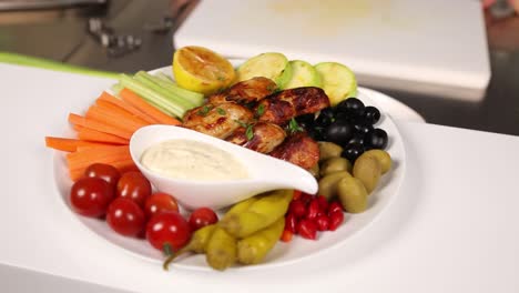 chicken wings with vegetables and dip
