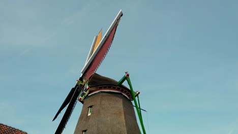 old dutch windmill in zaanse schans, netherlands in slow motion