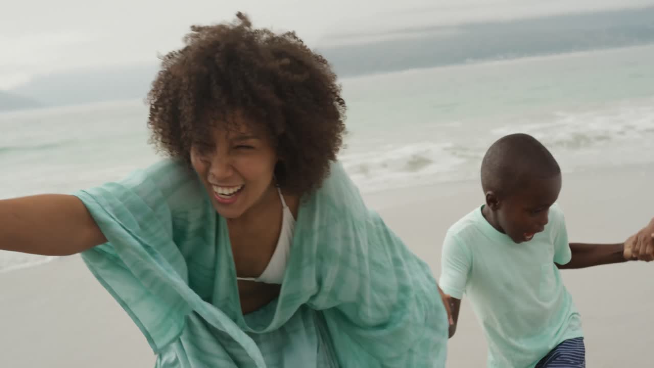 Family enjoying free time by the sea