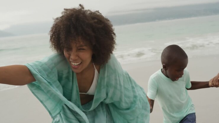 Family enjoying free time by the sea