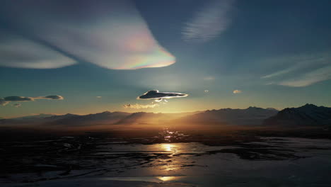 The-polar-stratospheric---nacreous-clouds-over-Vatnajokull-Glacier-Cap-in-South-Iceland---aerial