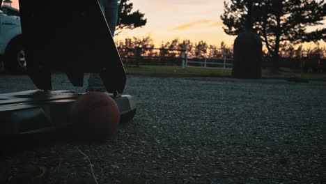 Man Playing Basket Ball at Sunset