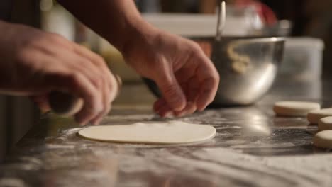 Preparation-of-Aloo-Paratha,-paratha,-roti,-chapati-Punjab,-hands-rolling-dough