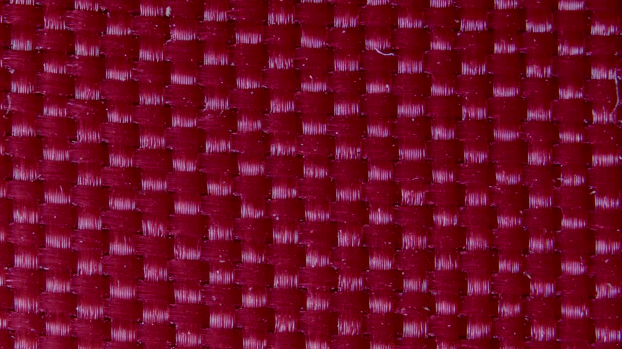 Close-up of woven fabric fibers under microscope