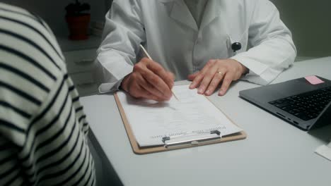 doctor reviewing patient intake form