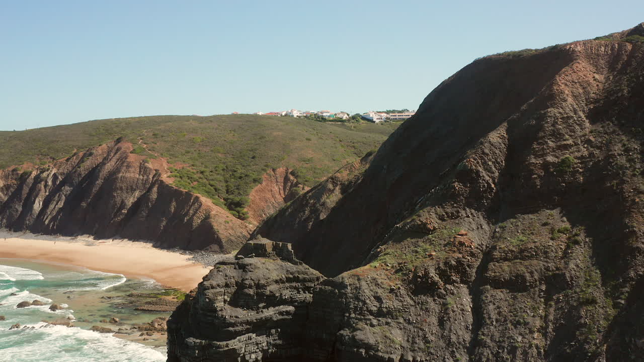 Aerial: The cliffs near the town of Arrifana in Portugal