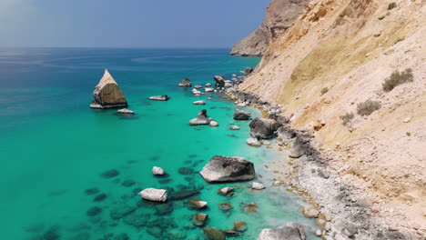 rocks on the calm shore of shoab beach near qalansiyah in socotra island, yemen