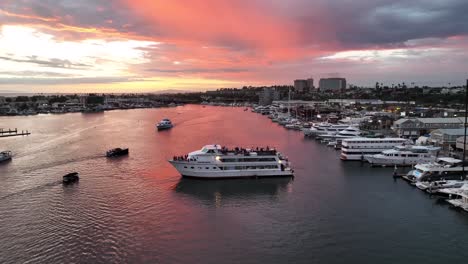 Reverse-Aerial-View-of-Yachts-in-Harbor