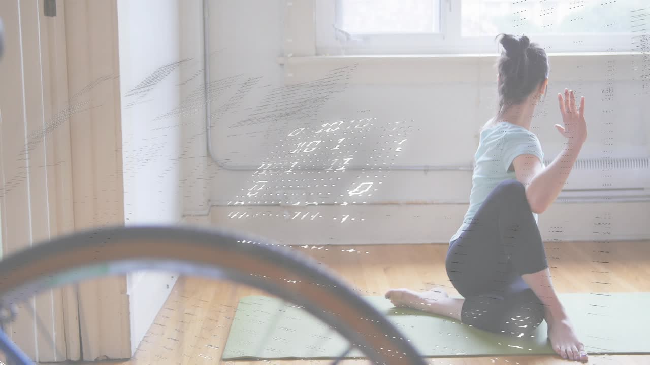 Yoga practitioner opening mat twisting spine for mobility with dot grid drifting over bike wheel