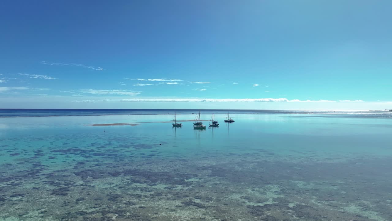 Yacht Boats Anchored Over Serene Waters Of Mo'orea Island, French Polynesia